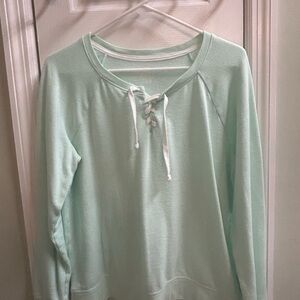 Women's medium size, aquamarine long sleeve top, it's as pretty as it is warm.